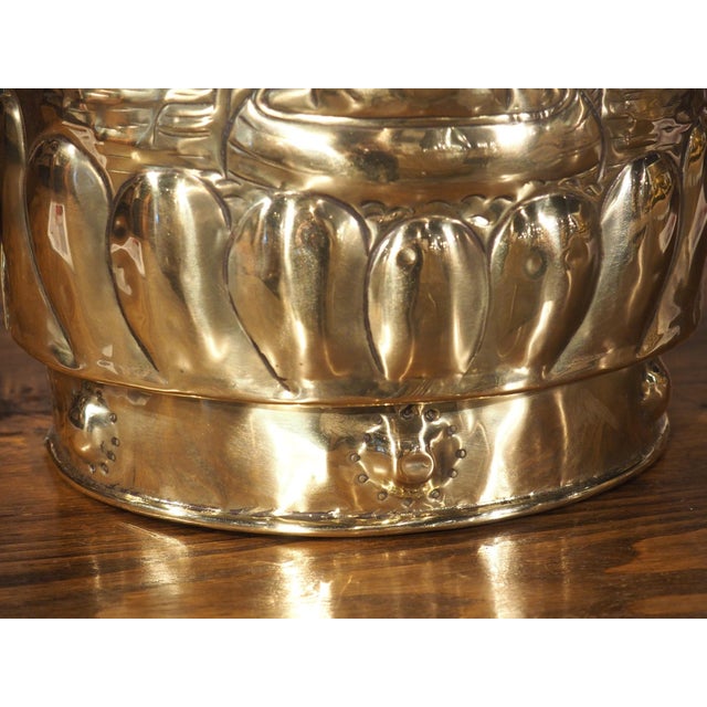 More information coming soon… A charming French vessel from circa 1900, this polished brass wine cooler or jardiniere is...