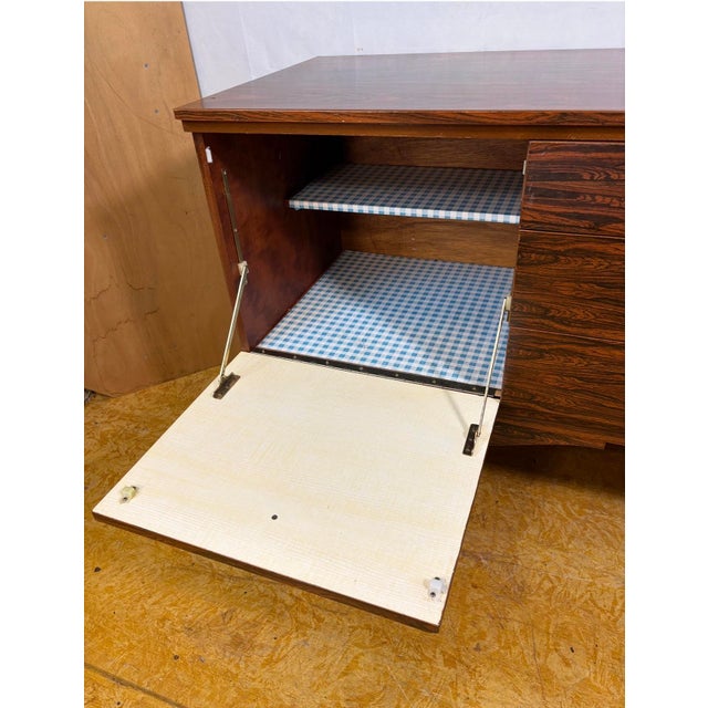 Mid-Century Modern Sideboard by Beautility, 1960, in Very Good conditions. Designed 1960 to 1969 This piece is attributed...