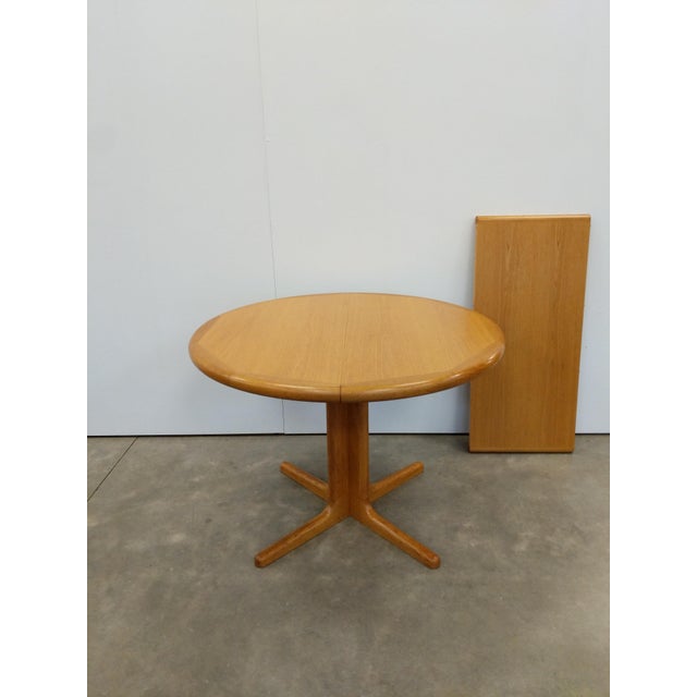 Authentic vintage mid century Danish / Scandinavian Modern oak extendable dining table with 1 leaf. By Laurits M Larsens...