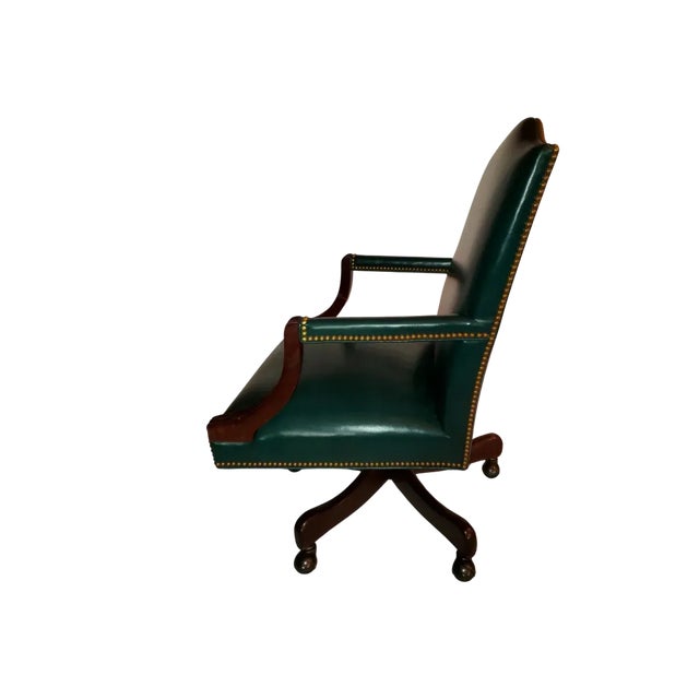 Emerald green leather Executive Desk Chair made in USA by Hancock and Moore. Mahogany arms and legs supported on 5 brass...