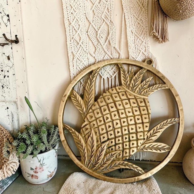 Elevate your kitchen decor with the Brass Circular Pineapple Trivet, a stunning blend of functionality and style. Crafted...