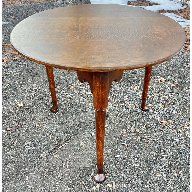18th century style Georgian oak cricket / pub table. Beautifully shaped apron with three turned kegs ending in pad feet....