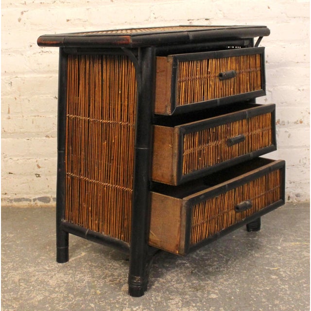 Pair of wicker and bamboo bedside tables with drawer storage. Appealing 'A' frame design with contrasting tan and black...