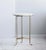 Understated and elegant, the Occasions Occasional Table is topped with a round, white-marble top that is sealed for daily...
