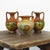 This beautiful set of three antique earthenware vases dates from Belgium, circa 1920. Each vase is hand-colored in...