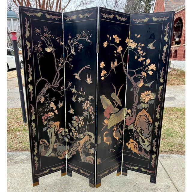 Midcentury Chinese export coromandel screen, a rare example where both sides of the panel showcase an equally strong...
