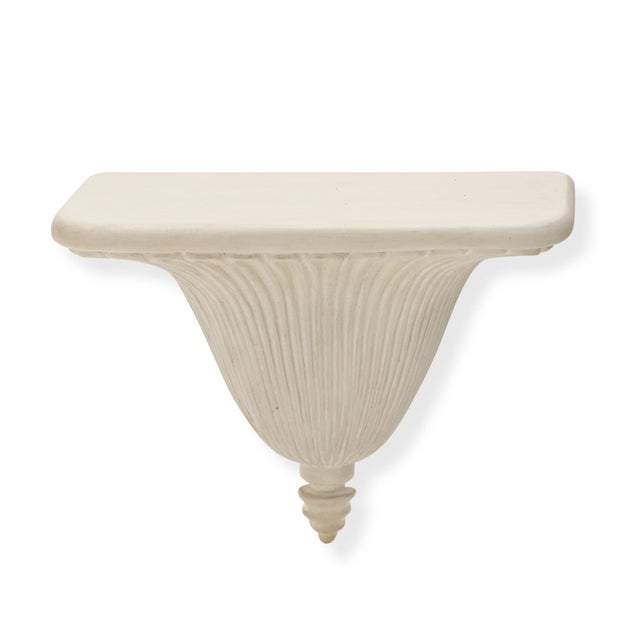 Our Regency Wall Bracket features elegant fluted detailing that fans out from a central finial, reminiscent of classical...