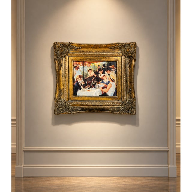 A richly framed limited-edition artist-enhanced reproduction of Pierre-Auguste Renoir’s iconic Luncheon of the Boating...
