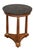 A handsome French round table or gueridon in the Empire style, featuring a circular top of figured black marble (19 3/4"...