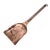 Hand-forged in the late 19th to early 20th century, this copper and iron hearth shovel reflects the utilitarian metalwork...