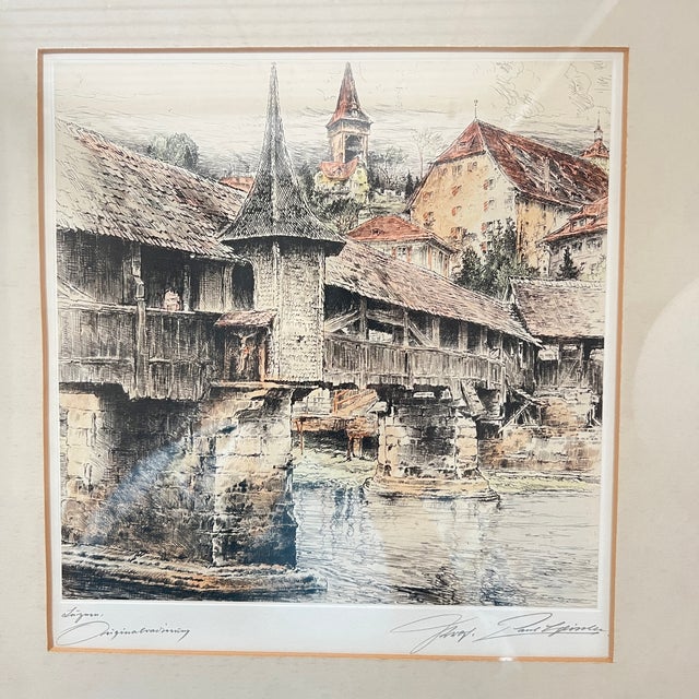 Capture the essence of Swiss history and artistry with this signed original etching of the Old Spreuer Bridge by Paul...