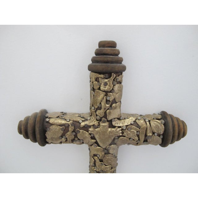 Stunning hand crafted Mexican folk art Milagros cross. Thick hand carved dark wood with hand turned finials. Heavily...