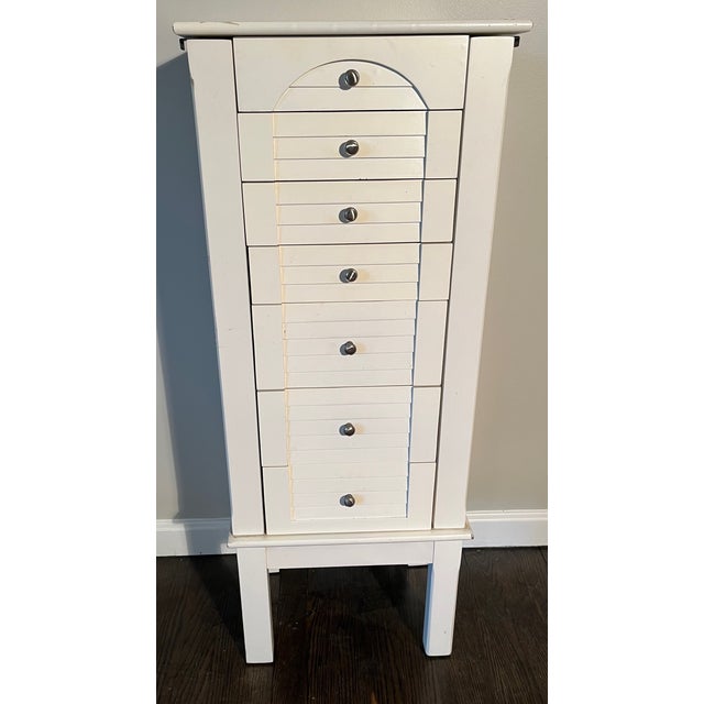 Would you like one place to organize and store all of your jewelry? This superb cabinet is free standing and pretty enough...