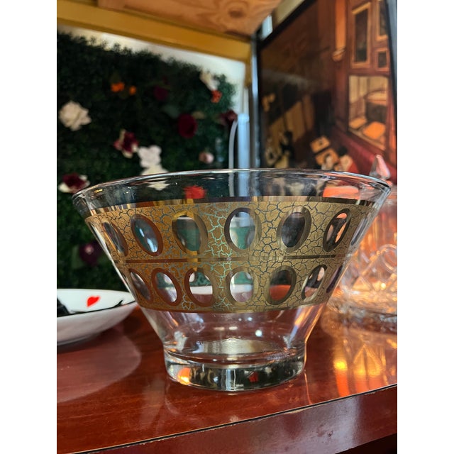 Up for consideration is a beautiful vintage MCM green and gold glass serving bowl. This would look lovely in your home and...