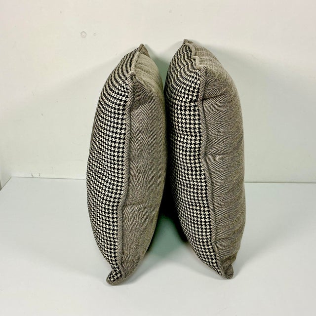 Our two favorite menswear plaid patterns are houndstooth and herringbone. These boho chic pair of decorative pillows have...