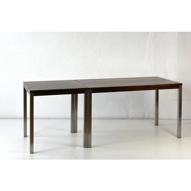 This two individual tables can be combined to create an impressive 239 cm long panel. The vibrant veneer of tropical...