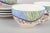 Gien "Savane", set of four large morning cups with matching saucers. Set of four large faience morning cups with matching...