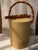 Beautiful grasscloth-covered ice bucket with faux bamboo handle and matching tongs. An MCM must for your bar cart,...