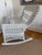 This white wicker rocking chair was purchased in Manhattan on Lexington Ave in early 1990s. Has been well taken care of....