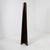 A floor-standing mirror with clean, slender lines, featuring a wooden frame that tapers toward the top. The sloping sides...