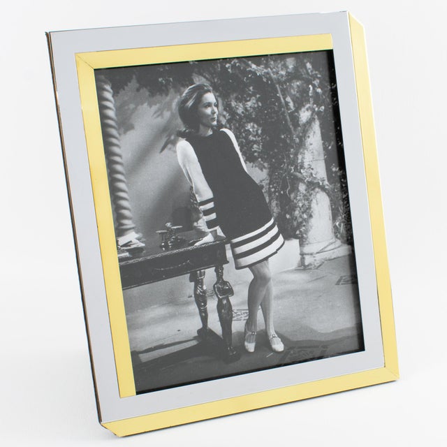 This stunning modernist picture frame was designed by the renowned French luxury company Lancel Paris. The piece was...