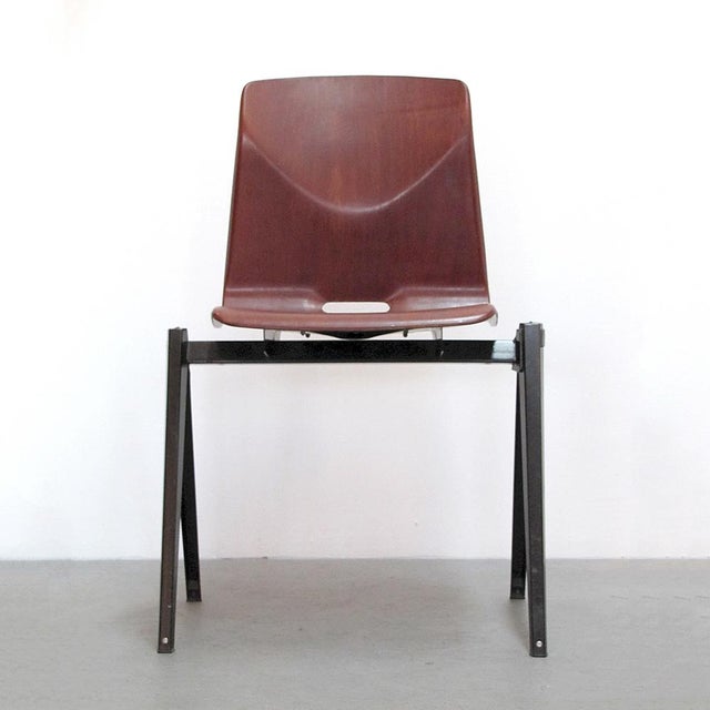 Elegant cherry colored pagwood industrial dining chairs, on stackable, espresso color enameled metal frames by Elmar...