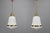 This rare pair of “Luzette” pendant lamps was designed by Peter Behrens for AEG and Siemens in the 1930s, representing one...