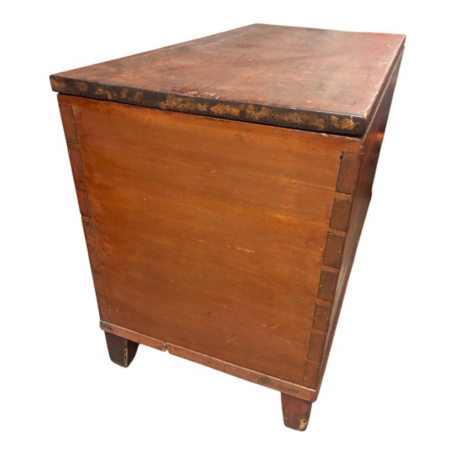 The Dovetail Antique Wood Trunk is a primitive wood box with a candle box inside, making it a unique and functional piece...