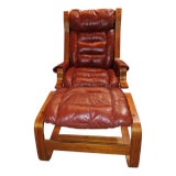 Exquisite Vintage Siesta Lounge Leather Chair and Matching Ottoman. For Sale