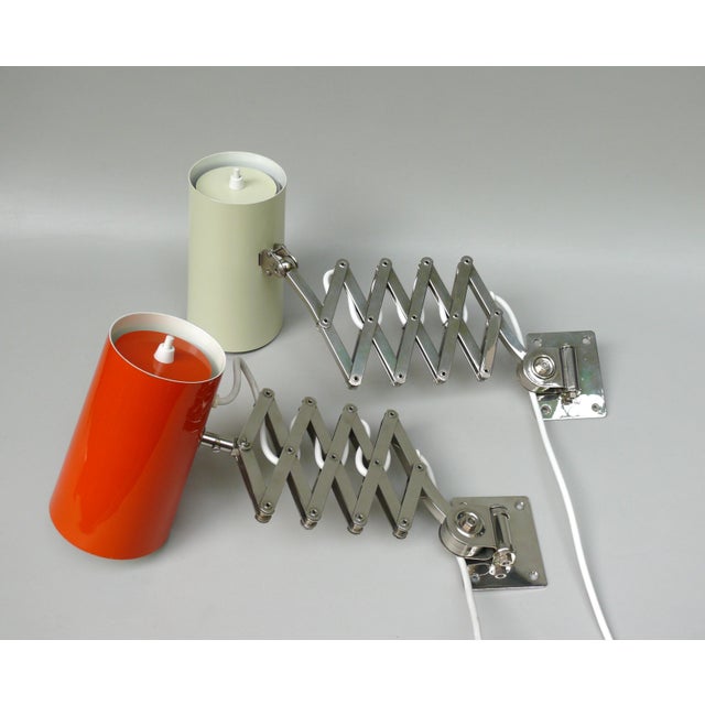 A pair of rare scissor lamps, manufactured in the 1960s in the typical high quality of Hala Hannoversche Lampenfabrik....