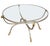 A fine French round cocktail or coffee low table from the Mid-Century Modern period, featuring a circular glass top set...