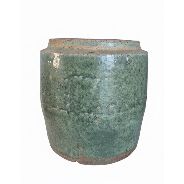 This jar originates from the famous Shiwan kilns in Guangdong, China. It dates from the late 19th century to early 20th...