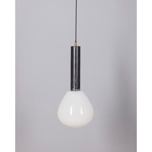 Pendant lamp with black metal frame and white glass lampshade, adjustable height, Italian design, 1970s. Up to 250V...