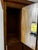 Rare antique oak postal mailbox cabinet featuring 24 individual numbered compartments with original hardware and...