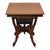 An antique oak table, attributed to RJ Horner, featuring distinctive chip-carved decoration. This piece showcases the...