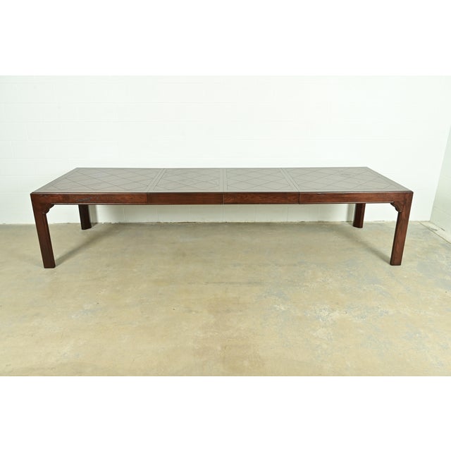 A gorgeous mid-century modern Hollywood Regency Chinoiserie extension dining table By Henredon USA, Circa 1970s Carved...