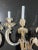 A fine Louis XV silver plated over bronze five arm wall sconce from the Belle Époque period. Five as rose from a foliate...