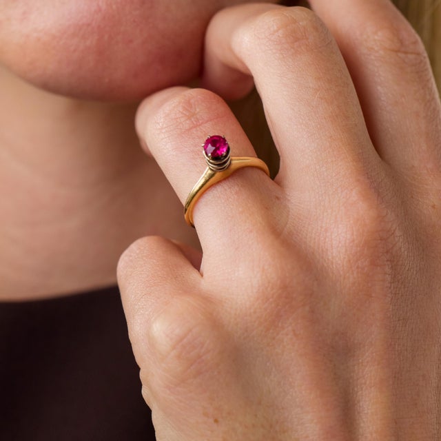 This striking vintage solitaire ring is a beautifully geometric design from the 1970’s, centered by a synthetic round...