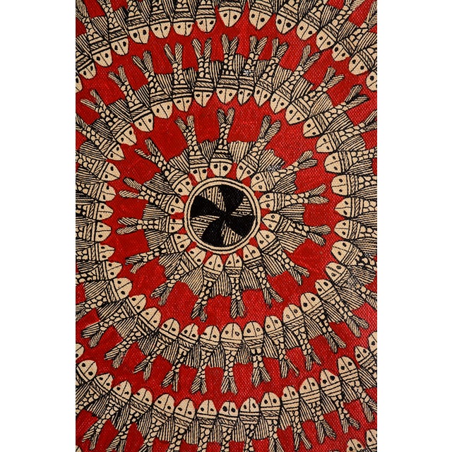 Celebrate the timeless beauty of Indian folk art with this intricate Madhubani painting by Mamta Devi, a recipient of the...