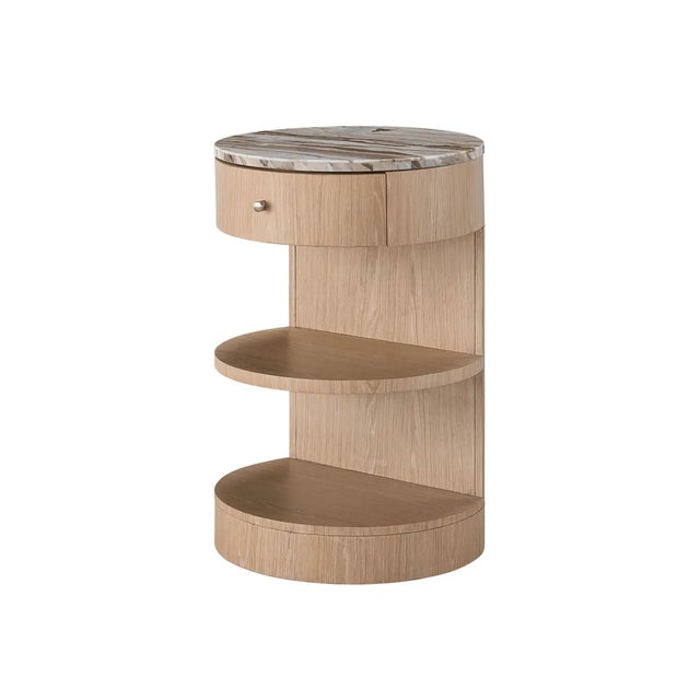 Showcasing a free-spirited silhouette, the Round Nightstand pushes design boundaries with its half-moon shaped shelves and...