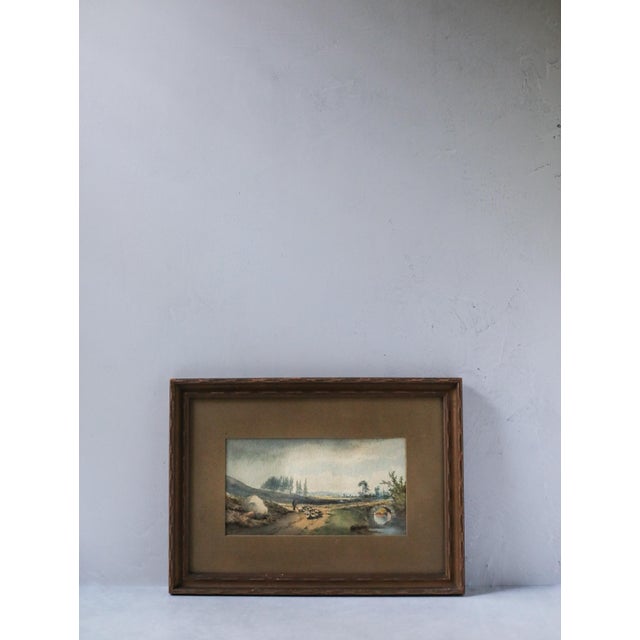 Original late-Victorian watercolor landscape, signed “J. Newlands” and dated 1876, depicting a shepherd or herder driving...