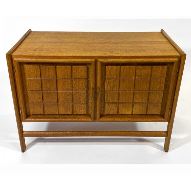 Scandinavian Modern Henning Kjærnulf Style Oak Cabinet Offered for sale is a Henning Kjaernulf-style midcentury...