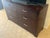 This substantial double dresser with matching mirror makes a striking statement in any bedroom. The dresser is finished in...