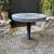 20th century brutalist side table with concrete top and steel base. Suitable for outdoor use.