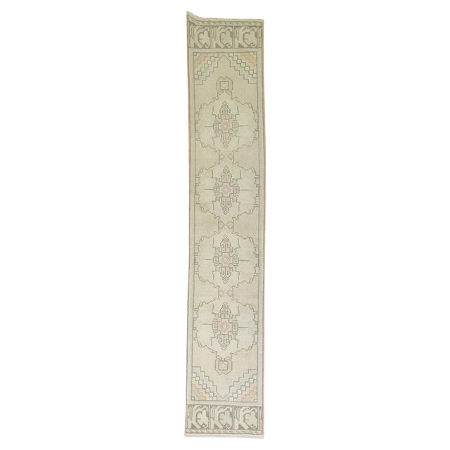 A mid-20th century geometric skinny Turkish runner Measures: 1'10'' x 9'3''.