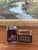 This set features two collectible vintage tabletop lighters, each with distinctive mid-century character and...