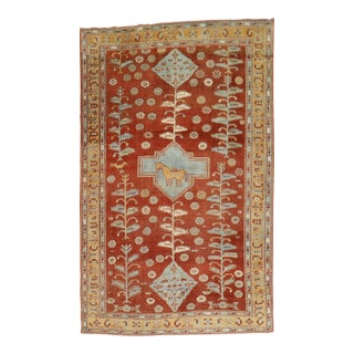 Early 20th Century Quirky Folk Art Tribal Camel Medallion Caucasian Rug - 5'9" x 8'4" For Sale