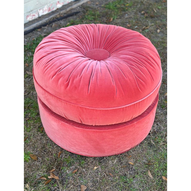 This beautiful ottoman is tall and can be used as a stool. It is vintage and we had it recovered in a luxurious pink velvet.