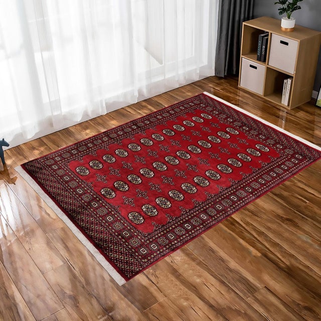Transform the interior of your home with a beautiful hand-knotted Bokhara rug. Meticulously crafted with intricate...
