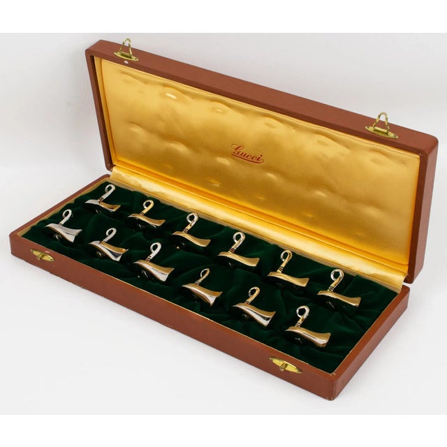 Dine in style with these whimsical chromed metal and enamel luxury place card holders designed by Gucci, Italy. The set of...